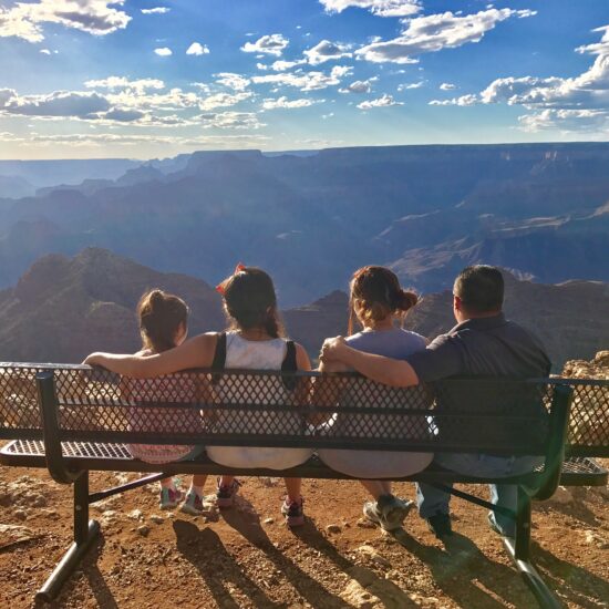 Family on a bench at Desert View Grand Canyon